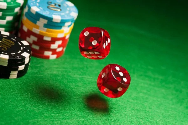 komoslot slot game showing stake selector and real-time balance display